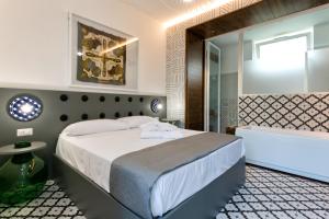 Postel nebo postele na pokoji v ubytování Maison Di Fiore B&B