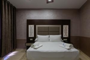 Ένα ή περισσότερα κρεβάτια σε δωμάτιο στο Hotel Jibal Chaouen