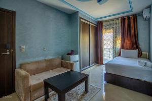 Ένα ή περισσότερα κρεβάτια σε δωμάτιο στο Hotel Jibal Chaouen