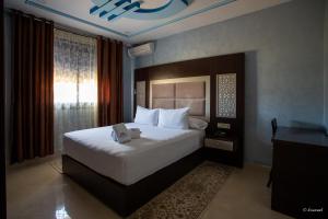 Ένα ή περισσότερα κρεβάτια σε δωμάτιο στο Hotel Jibal Chaouen