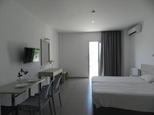 TV a/nebo společenská místnost v ubytování Evabelle Napa Hotel Apartments