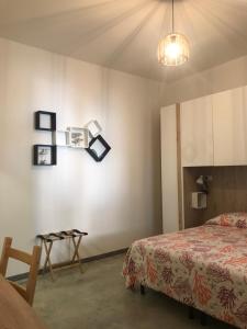 Postel nebo postele na pokoji v ubytování 40° Parallelo Guest House