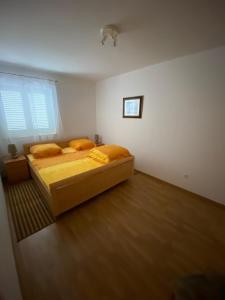 Postel nebo postele na pokoji v ubytování Apartment Coskovic
