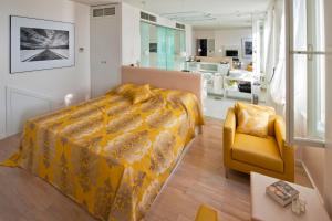 Posteľ alebo postele v izbe v ubytovaní Riva Luxury Suites