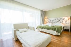 Postel nebo postele na pokoji v ubytování Hotel Jurmala Spa