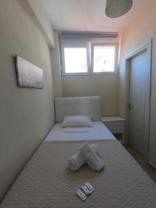 Postel nebo postele na pokoji v ubytování BLUE VIEW Apartments