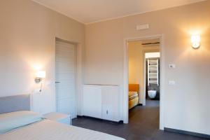 Postel nebo postele na pokoji v ubytování Residenza Cappelli - Affittacamere