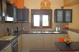 Kuchyň nebo kuchyňský kout v ubytování George’s Home