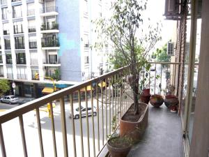 Un balcón o terraza en Departamento de dos dormitorios para 6 personas en el centro