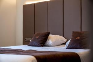 Uma cama ou camas num quarto em Hotel Central