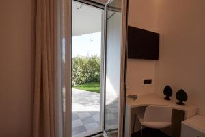 Telewizja i/lub zestaw kina domowego w obiekcie Orizzonte MHotel