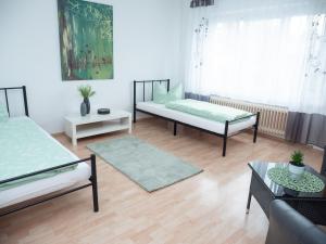 Postel nebo postele na pokoji v ubytování Ferienwohnungen Hirschen Lottstetten