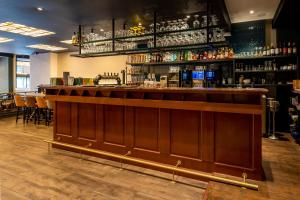 A área de bar ou lounge em Hotel Central