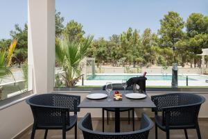 Bazén v ubytovaní Mossa Well Being Hotel alebo v jeho blízkosti