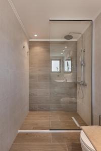 Kúpeľňa v ubytovaní Mossa Well Being Hotel