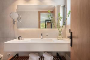 Kúpeľňa v ubytovaní Mossa Well Being Hotel