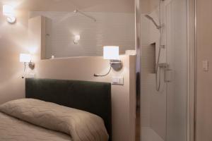 Posteľ alebo postele v izbe v ubytovaní Residenza Cappelli - Case Vacanze