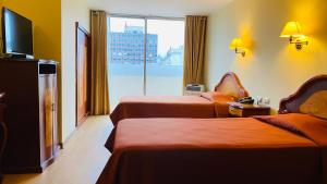 Televisyen dan/atau pusat hiburan di Hotel Continental Lima