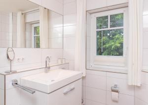 Koupelna v ubytování Haus Watthus - Wohnung Himmel + 42 fotografií