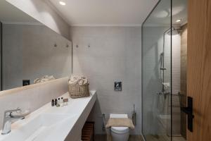 Kúpeľňa v ubytovaní Mossa Well Being Hotel