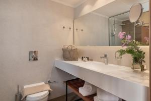Kúpeľňa v ubytovaní Mossa Well Being Hotel