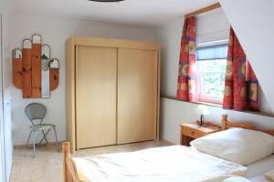 Postel nebo postele na pokoji v ubytování Gaestehaus-Sylvie-Wohnung-2