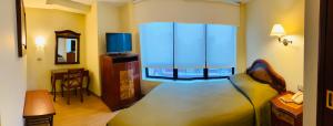 Katil atau katil-katil dalam bilik di Hotel Continental Lima