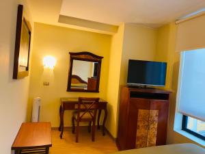 Televisyen dan/atau pusat hiburan di Hotel Continental Lima