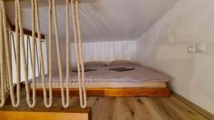 Postel nebo postele na pokoji v ubytování Apartmány Turold Mikulov