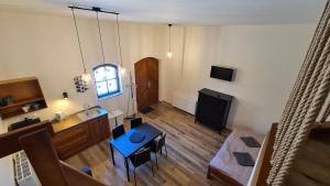 TV a/nebo společenská místnost v ubytování Apartmány Turold Mikulov