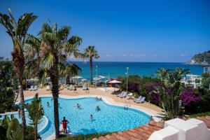Bazén v ubytování Hotel Ipomea Club nebo v jeho okolí