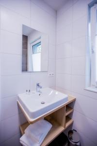 Schoko Apartments tesisinde bir banyo