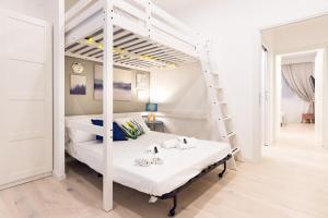 A bed or beds in a room at Apartment Greppi 5