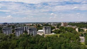 Nespecifikovaný výhled na destinaci Lodž nebo výhled na město při pohledu z apartmánu