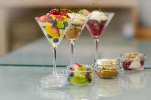 
a variety of desserts are arranged on a table at Killaran House in Killarney
