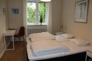 Säng eller sängar i ett rum på Falköpings Vandrarhem/Hostel