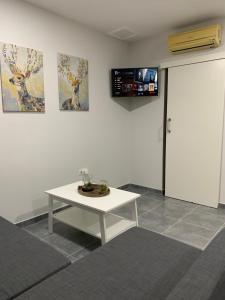 Televízia a/alebo spoločenská miestnosť v ubytovaní Apartamento centrico en Puerto del Rosario + 8 fotografií
