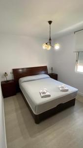 Ένα ή περισσότερα κρεβάτια σε δωμάτιο στο Golden Apartment