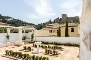Vonkajšia záhrada v ubytovaní INOLVIDABLES VISTAS a LA ALHAMBRA,
