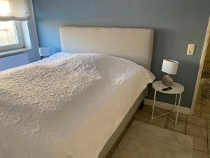 Кровать или кровати в номере Zur Sonnenblume