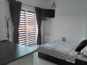 Posteľ alebo postele v izbe v ubytovaní Apartamencik na Doby - Lubin