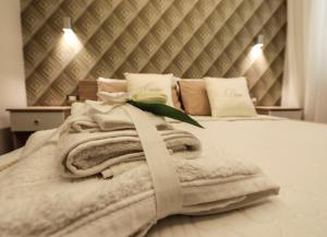 Posteľ alebo postele v izbe v ubytovaní Carpe Diem Rooms