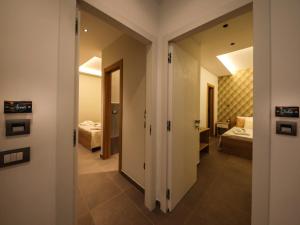 Posteľ alebo postele v izbe v ubytovaní Carpe Diem Rooms
