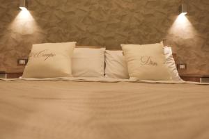 Posteľ alebo postele v izbe v ubytovaní Carpe Diem Rooms