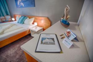 Postel nebo postele na pokoji v ubytování Frühstückshotel Waldbauer