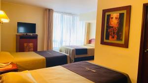Katil atau katil-katil dalam bilik di Hotel Continental Lima