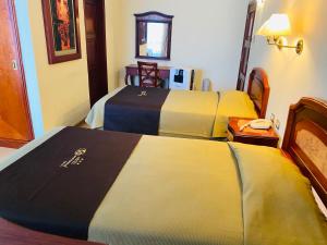 Katil atau katil-katil dalam bilik di Hotel Continental Lima