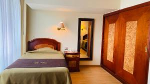 Katil atau katil-katil dalam bilik di Hotel Continental Lima