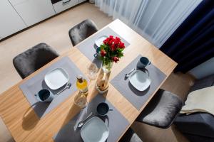 Posedenie v ubytovaní Apartament SŁONECZNY 7 Dziwnów Gardenia z widokiem na morze EPapartamenty