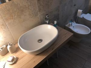 Kúpeľňa v ubytovaní APARTMENT VITERBO CENTRO CORSO
